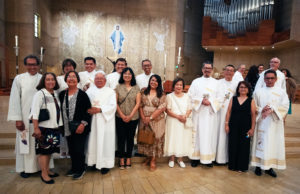 Deacons and their wives pose after a special Diaconate Mass at the Cathedral of Our Lady of the Angels on Aug. 10 to celebrate the feast day of St. Lawrence, the notable third-century deacon and martyr. (Victor Alemán)