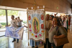 Parishioners process in to celebrate the many ethnic and cultural groups in the archdiocese during the 20th anniversary “One Mother, Many Peoples” Mass at the Cathedral of Our Lady of the Angels on Sept. 7. (John Rueda)