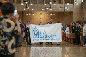 Parishioners process in to celebrate the many ethnic and cultural groups in the archdiocese during the 20th anniversary “One Mother, Many Peoples” Mass at the Cathedral of Our Lady of the Angels on Sept. 7. (John Rueda)