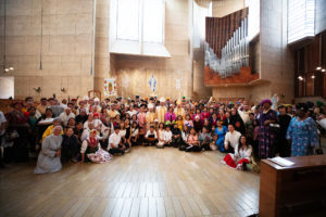 All who participated in the 20th anniversary “One Mother, Many Peoples” Mass at the Cathedral of Our Lady of the Angels on Sept. 7 pose for a group photo. (Victor Alemán)