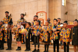 Drummers from Transfiguration School in Los Angeles performed at the front of the cathedral to start the annual Missionary Childhood Association Youth Appreciation Mass on Oct. 16. (John Rueda) 