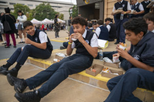 Students enjoy In-N-Out on the cathedral's outdoor plaza following the annual Missionary Childhood Association Youth Appreciation Mass on Oct. 16. (John Rueda) 