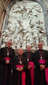 LA’s four newest auxiliary bishops in front of the tomb of St. Pope Leo the Great inside St. Peter’s Basilica during a formation course for new bishops in Rome last month. (Submitted photo)