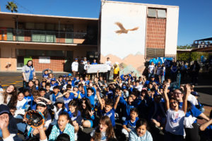 Students cheer during an event at Incarnation School in Glendale on Nov. 8 to celebrate funds raised for Catholic Education Foundation of Los Angeles thanks to the Dodgers winning the World Series.(Victor Alemán)