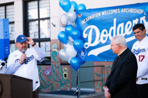 Incarnation School Principal Colby Boysen, left, speaks along with Los Angeles Archbishop José H. Gomez and Paul Escala, senior director and Superintendent of Catholic Schools, during an event on Nov. 8 to celebrate funds raised for Catholic Education Foundation of Los Angeles thanks to the Dodgers winning the World Series. (Victor Alemán)