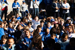 Students cheer during an event at Incarnation School in Glendale on Nov. 8 to celebrate funds raised for Catholic Education Foundation of Los Angeles thanks to the Dodgers winning the World Series.(Victor Alemán)