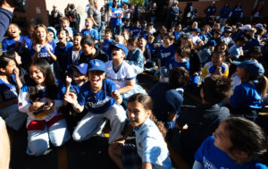 Students cheer during an event at Incarnation School in Glendale on Nov. 8 to celebrate funds raised for Catholic Education Foundation of Los Angeles thanks to the Dodgers winning the World Series.(Victor Alemán)