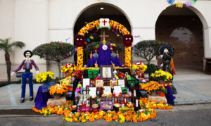 Besides altars and Mass, Día de los Muertos celebrations included mariachis, folklorico dancing, sawdust carpet art installations, and more. (Victor Alemán)