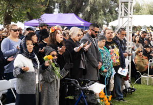 Parishioners attend the All Souls’ Day/Día de los Muertos Mass at San Fernando Mission Cemetery on Nov. 2. (Victor Alemán)
