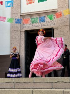 Folklorico dancers perform for nearly 200 students from nearby Catholic schools at Calvary Cemetery in East LA on Oct. 24 to learn about the meaning of Día de los Muertos. (Maria Hurtado)