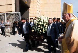 Pallbearers carry the casket of Dodgers legend Fernando Valenzuela following his funeral Mass on Nov. 6 at the Cathedral of Our Lady of the Angels. (Victor Alemán)