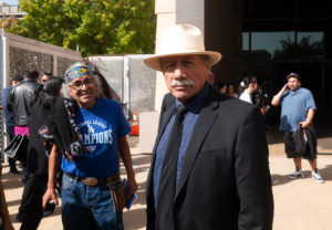 Actor Edward James Olmos speaks to reporters following the funeral Mass of Dodgers legend Fernando Valenzuela on Nov. 6 at the Cathedral of Our Lady of the Angels. (Victor Alemán)