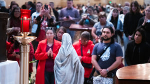 Thousands who attended the OneLife LA event on Jan. 18 venerated the Virgin Mary statue that survived  the Eaton Fire and the tabernacle saved from the rubble of Corpus Christi Church in the Palisades Fire. (Victor Alemán)