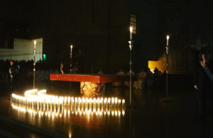 Candles symbolizing a baby killed by abortion glow in darkness at the foot of the altar during the annual Requiem Mass for the Unborn, the conclusion to the OneLife LA celebration at the Cathedral of Our Lady of the Angels on Jan. 18. (Victor Alemán)