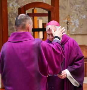 Los Angeles Archbishop José H. Gomez receives his ashes during a special Ash Wednesday liturgy at the Cathedral of Our Lady of the Angels on March 5, the first day of Lent. (Victor Alemán)