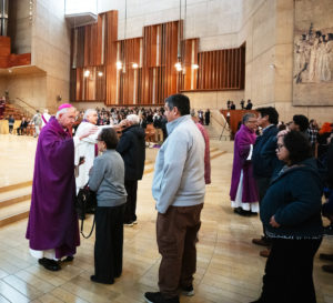 Los Angeles Archbishop José H. Gomez offers ashes during the Ash Wednesday Mass at the Cathedral of Our Lady of the Angels on March 5, the first day of Lent. (Victor Alemán)