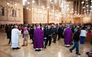 Attendees receive ashes during the Ash Wednesday Mass at the Cathedral of Our Lady of the Angels on March 5, the first day of Lent. (Victor Alemán)