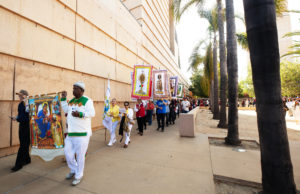 Attendees process into the Cathedral of Our Lady of the Angels on June 22 for Mass during the National Eucharistic Pilgrimage. ((Victor Alemán)
