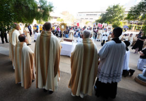 Hundreds gather during a Eucharistic procession in the outdoor plaza at the Cathedral of Our Lady of the Angels on June 22 during the National Eucharistic Pilgrimage. ((Victor Alemán)
