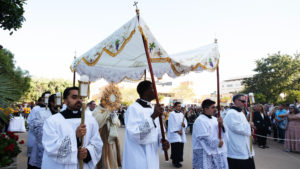 Archbishop José H. Gomez carries a monstrance during a Eucharistic procession for the feast of Corpus Christi at the Cathedral of Our Lady of the Angels on June 22 during the National Eucharistic Pilgrimage. ((Victor Alemán)