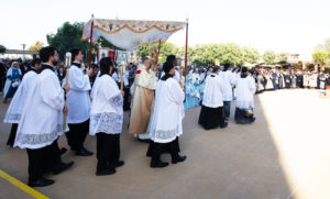 Bishop Sławomir Szkredka carries a monstrance during a Eucharistic procession for the feast of Corpus Christi at the Cathedral of Our Lady of the Angels on June 22 during the National Eucharistic Pilgrimage. ((Victor Alemán)
