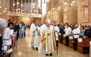 Archbishop José H. Gomez processes in to begin the new priests ordination Mass at the Cathedral of Our Lady of the Angels on May 31. (Victor Alemán)