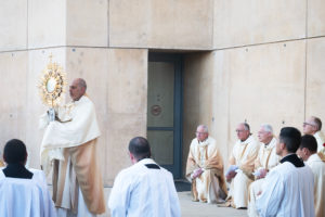 Bishop Albert Bahhuth carries a monstrance during a Eucharistic procession for the feast of Corpus Christi at the Cathedral of Our Lady of the Angels on June 22 during the National Eucharistic Pilgrimage. ((Victor Alemán)