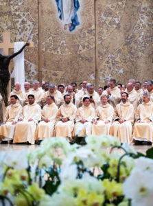 The eight new priests receive applause during the ordination Mass at the Cathedral of Our Lady of the Angels on May 31.(Victor Alemán)