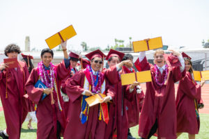 Graduates of Bishop Alemany High School in Mission Hills are all smiles during their graduation ceremony on May 23. (Bishop Alemany High School)