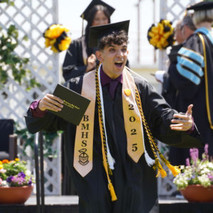 A graduate celebrates after receiving his diploma during Bishop Montgomery High School’s graduation ceremony on May 30. (Bishop Montgomery High School)