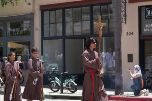 A Eucharistic procession travels down Main Street toward Mission Basilica San Buenaventura on June 20 during the National Eucharistic Pilgrimage’s final weekend. (Katie Trejo)