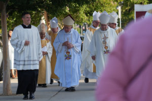 Cardinal Christophe Pierre, papal nuncio to the United States, front right, and Los Angeles Archbishop José H. Gomez, center, arrive to concelebrate a Mass at Sacred Heart Church in Altadena on June 20, 2025, during the National Eucharistic Pilgrimage. (Katie Trejo)