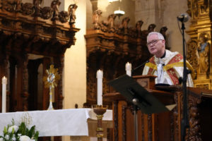 Auxiliary Bishop Matthew Elshoff addresses the faithful inside St. Vincent DePaul Church in Los Angeles during a Eucharistic adoration service as part of the National Eucharistic Pilgrimage’s appearance in LA on June 21. (Katie Trejo)