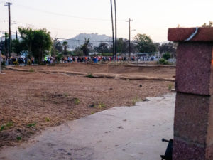 Hundreds participating in the National Eucharistic Pilgrimage procession through the streets of Altadena on June 20 passed several empty lots that once contained the homes burned down in the Eaton Fire. (Katie Trejo)