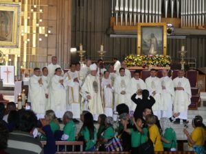 Archbishop José  H. Gomez poses with concelebrating priests following a special Mass at the Basilica of Our Lady of Guadalupe in Mexico City during the archdiocese's annual pilgrimage to Mexico on July 4. (Submitted photo/Archdiocese of Los Angeles)