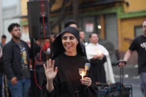 Sister Maria Goretti of the Sisters Poor of Jesus Christ smiles during a Eucharistic procession through Skid Row in downtown Los Angeles on July 19. (Alex Salcedo)