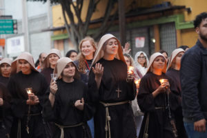 Members of the Sisters Poor of Jesus Christ walk and pray during a Eucharistic procession through Skid Row in downtown Los Angeles on July 19. (Alex Salcedo)