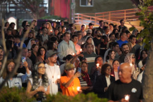 Hundreds gather to pray with the Blessed Sacrament during a Eucharistic procession through Skid Row in downtown Los Angeles on July 19. (Alex Salcedo)