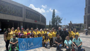 Archbishop José  H. Gomez poses with pilgrims outside the Basilica of Our Lady of Guadalupe in Mexico City during LA Catholics’ annual pilgrimage to Mexico on July 4. (Submitted photo/Archdiocese of Los Angeles)
