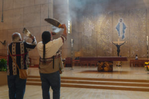 Indigenous attendees light incense for a blessing during the “One Mother, Many Peoples” Mass at the Cathedral of Our Lady of the Angels on Sept. 6, which celebrated the diverse cultures, organizations, and ethnic ministries in the Archdiocese of Los Angeles. (Reese Cuevas/Archdiocese of Los Angeles)