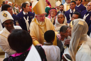 Archbishop José H. Gomez greets attendees following the “One Mother, Many Peoples” Mass at the Cathedral of Our Lady of the Angels on Sept. 6, which celebrated the diverse cultures, organizations, and ethnic ministries in the Archdiocese of Los Angeles. (Reese Cuevas/Archdiocese of Los Angeles)