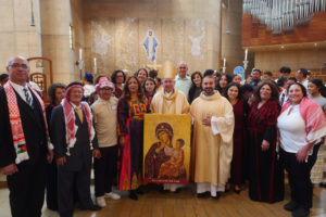Archbishop José H. Gomez poses with attendees following the “One Mother, Many Peoples” Mass at the Cathedral of Our Lady of the Angels on Sept. 6, which celebrated the diverse cultures, organizations, and ethnic ministries in the Archdiocese of Los Angeles. (Reese Cuevas/Archdiocese of Los Angeles)