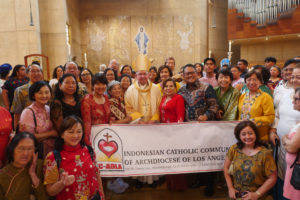 Archbishop José H. Gomez poses with attendees following the “One Mother, Many Peoples” Mass at the Cathedral of Our Lady of the Angels on Sept. 6, which celebrated the diverse cultures, organizations, and ethnic ministries in the Archdiocese of Los Angeles. (Reese Cuevas/Archdiocese of Los Angeles)