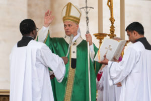 Pope Leo XIV gives his blessing at the conclusion of Mass for the Jubilee of Migrants and the Jubilee of the Missions in St. Peter’s Square at the Vatican Oct. 5, 2025. (CNS photo/Lola Gomez)