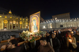 An image of Mary is carried around St. Peter's Square at the Vatican during the Jubilee of the Missions nighttime recitation of the rosary Oct. 4, 2025. (CNS photo/Pablo Esparza)