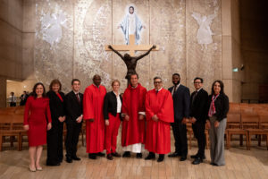 Father Barnaby Johns, OSA, the prior provincial of the Province of St. Augustine in California, center, poses with legal professionals following the Red Mass at
the Cathedral of Our Lady of the Angels on Oct. 14. (Peter Lobato)