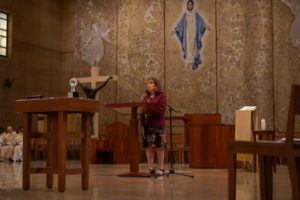 Ann Sanders, the liaison for the Archdiocese of Los Angeles' healthcare ministry, speaks during the Healthcare Professionals Mass, known as the White Mass, at the Cathedral of Our Lady of the Angels on Oct. 12. (Lizzie Friedrich)