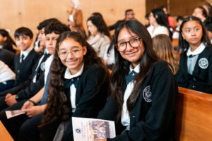 Students from Santa Isabel School in Boyle Heights smile during the annual Missionary Childhood Association (MCA) Youth Appreciation Mass at the Cathedral of Our Lady of the Angels on Oct. 15. (Isabel Cacho)