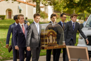 Young men carry the 300-pound reliquary holding the relics of St. Thérèse during the tour’s stop at Thomas Aquinas College in Santa Paula on Oct. 14. (Liam McDaniel/Thomas Aquinas College)