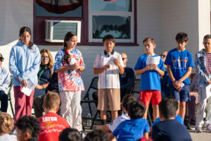 The student council offers prayers during a Veterans Day event at Holy Angels School in Arcadia on Nov. 10. (Lawrence Lane)